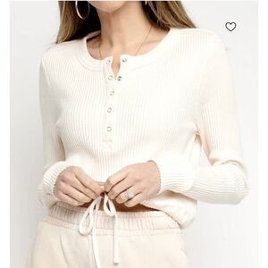 The Range Jumbo Stark Thermal Henley is cream. Waffle knit w/ snaps size small